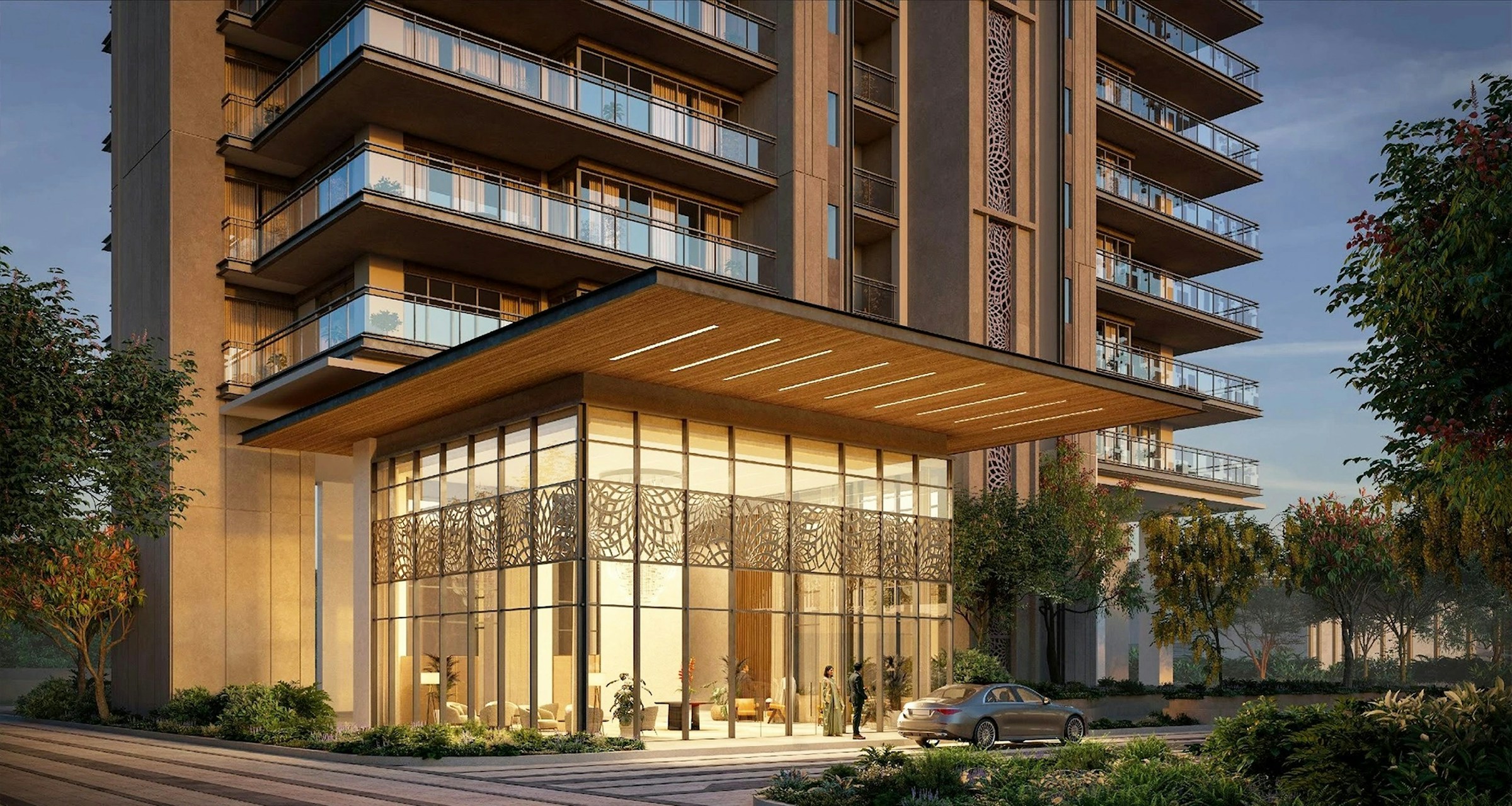 The lobby of a new residential tower at dusk